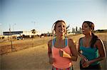 Women jogging and laughing