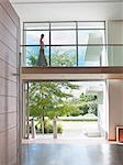 Woman on modern elevated walkway