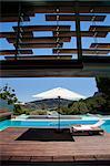 View of patio and swimming pool