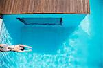 Woman in luxury swimming pool