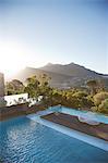 View of luxury swimming pool and mountains