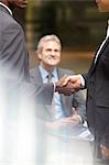 Business people handshaking