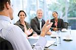 Businessman gesturing in meeting