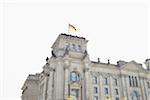 Low Angle View of German Flag on top of Reichstag Building, Berlin, Germany