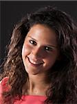 Portrait of teenage girl smiling and looking at camera