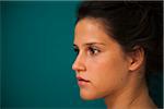 Close-up, side view portrait of teenaged girl, looking off into the distance