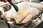 Brushing a Whole Roast Chicken with Butter