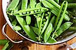 Fresh peas in a colander