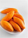 Whole Peeled Sweet Potatoes on a Dish