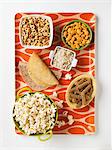 Assorted Grain Based Products: Taco Shells, Tortillas, Whole Grain Fusilli, Popcorn, Rice, Cereal and Goldfish Crackers