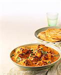 Chicken tikka masala with flatbread (India)