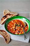 Bean and chickpea stew with toasted bread
