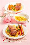 Duck breast with pineapple, oranges and baby carrots