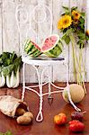 Organic Fruit and Vegetables; Halved Watermelon on a Chair