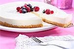 Cheesecake with berries, a piece removed