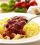 Ribbon pasta with tomato and garlic sauce