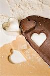 Cutting out heart-shaped biscuits