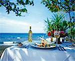 A table laid for a meal by the sea in Bali