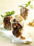 A trio of goulash with white bread