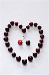 A heart made of sweet cherries