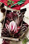 Assorted types of radicchio in a wooden box