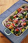 Mediterranean vegetable salad with tomatoes, cucumber, olives and onions