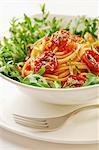 Delicious fresh pasta with balsamico marinated and dried tomatoes