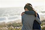 Couple standing on the beach