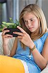 Girl playing with a video game