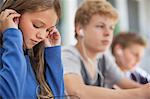 Students listening to music in a classroom