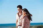 Romantic couple standing on the beach