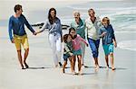 Family walking on the beach