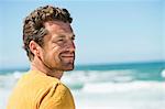 Man smiling on the beach