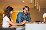 Couple at a bar counter