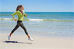 Woman jogging on the beach