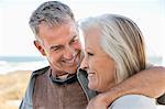 Close-up of a couple on the beach