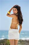 Beautiful woman posing on the beach