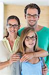 Portrait of a family wearing eyeglasses and smiling