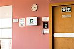 Emergency exit door with first aid kit and emergency phone