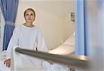 Patient sitting on hospital bed