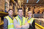 Workers smiling in warehouse