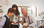 Friends relaxing together in kitchen