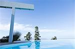 Trees and shower overlooking infinity pool