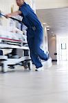 Hospital staff rushing patient to operating room