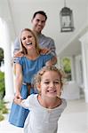 Family playing together on porch