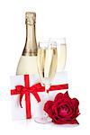 Two champagne glasses, letter and rose. Isolated on white background
