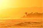 A golden Hawaiin sunset from Waikiki Beach, Hawaii.