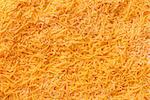 Grated cheese as background yellow. Nutrition. Food.