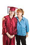 Portrait of smiling high school graduate and her proud mother.  Vertical view over white.