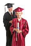 Senior woman graduate holding the diploma she just got from her professor.  Isolated on white